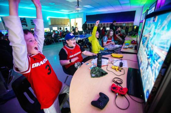 Team Sapphire members Ayden Stone (from left), Julian Trudel, Ryder Mustard and Tia Rowan play a game in a tournament in the École Dugald School Dragons Esports Lab. (Mikaela MacKenzie / Winnipeg Free Press)