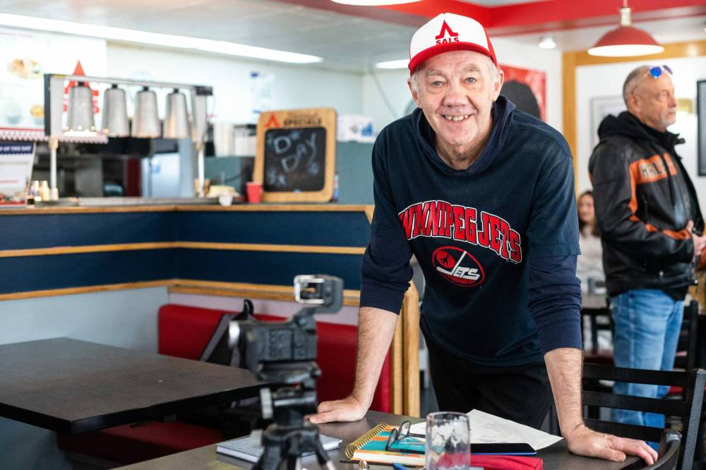 MIKAELA MACKENZIE / WINNIPEG FREE PRESS
                                Tim Froese with his camera Monday, documenting the closure of the notable North End restaurant.