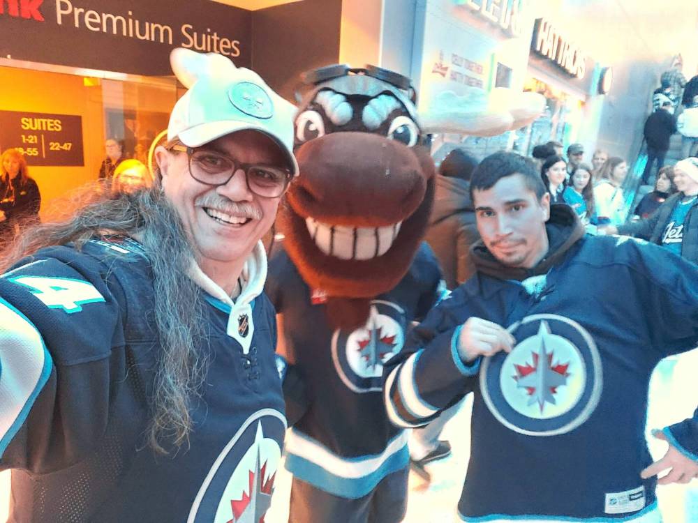 SUPPLIED
Harlan is an avid Jets fan who watched the first two games of their first-round National Hockey League playoff series with his dad.