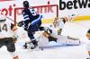 THE CANADIAN PRESS/Fred Greenslade
                                Vegas Golden Knights goaltender Laurent Brossoit makes a save on Winnipeg Jets’ Mark Scheifele during the first period of Game 4 in Winnipeg on Monday. Scheifele would crash heavily into the end boards during the play and leave the game due to injury a short time later.