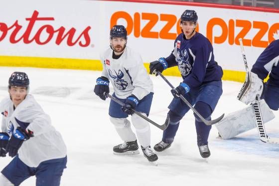 Manitoba Moose captain Jimmy Oligny (centre) says the team's first-round series against the Milwaukee Admirals has a personal element to it since the Admirals knocked the Moose out of the playoffs last year. (Mike Deal / Winnipeg Free Press files)