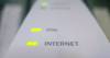 A parliamentary committee studying Canada’s slumping media industry will reportedly call for a five per cent tax on broadband Internet services to boost a sector struggling to adapt to technological changes and evolving consumer habits. Function lights are illuminated on a modem in Chelsea, Que., July 11, 2011. THE CANADIAN PRESS/Adrian Wyld
