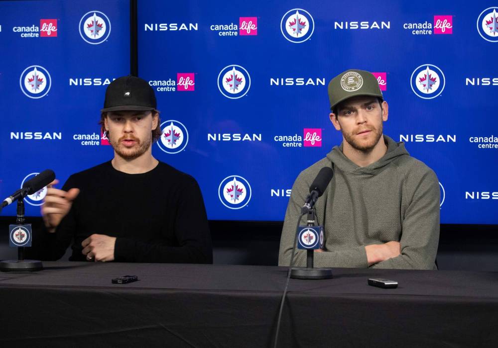 JESSICA LEE / WINNIPEG FREE PRESS
Winnipeg Jets players Mason Appleton (left) and Adam Lowry.