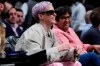 Megan Rapinoe poses during the first half of an NBA basketball game between the Brooklyn Nets and the Houston Rockets, Wednesday, March 29, 2023, in New York. (AP Photo/Frank Franklin II)