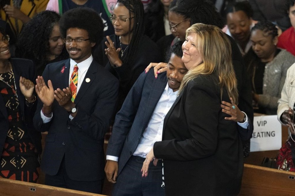Expelled Rep. Justin Pearson, D-Memphis, from left, expelled Rep. Justin Jones, D-Nashville, and Rep. Gloria Johnson, D-Knoxville, are recognized by the audience at Fisk University before Vice President Kamala Harris arrives, Friday, April 7, 2023, in Nashville, Tenn. (AP Photo/George Walker IV)