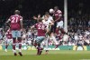 West Ham United's Kurt Zouma, right, Fulham's Andreas Pereira and Vinicius, second left, battle for the ball during the English Premier League soccer match at Craven Cottage, London, Saturday April 8, 2023. (Gareth Fuller/PA via AP)