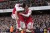 Arsenal players celebrate after scoring their side's fourth goal during the English Premier League soccer match between Arsenal and Leeds United at the Emirates Stadium in London, Saturday, April 1, 2023.(AP Photo/Kin Cheung)
