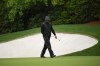 Tiger Woods walks on the 13th hole during the weather delayed third round of the Masters golf tournament at Augusta National Golf Club on Saturday, April 8, 2023, in Augusta, Ga. (AP Photo/Matt Slocum)