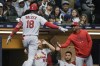 St. Louis Cardinals' Jordan Walker is congratulated after hitting a two-run home run during the third inning of a baseball game against the Milwaukee Brewers Saturday, April 8, 2023, in Milwaukee. (AP Photo/Morry Gash)