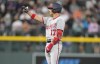 Washington Nationals' Alex Call gestures to the dugout after reaching second base on a double off Colorado Rockies starting pitcher Austin Gomber in the fifth inning of a baseball game Saturday, April 8, 2023, in Denver. (AP Photo/David Zalubowski)