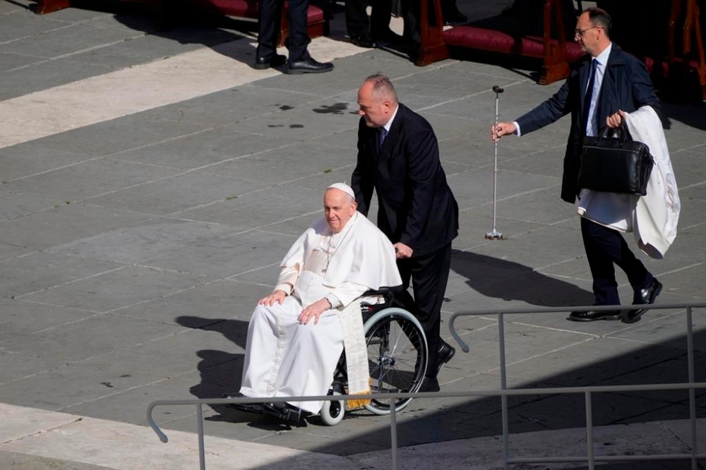 Pope Francis arrives in a wheelchair in St. Peter's Square at The Vatican where he will celebrate the Easter Sunday mass, Sunday, April 9, 2023. (AP Photo/Gregorio Borgia)