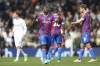 Crystal Palace's Marc Guehi celebrates after scoring his side's first goal, during the English Premier League soccer match between Leeds United and Crystal Palace at Ellend Road, in Leeds, England, Sunday April 9, 2023. (Nigel French/PA via AP)