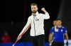 Swiss skip Yannick Schwaller celebrates a delivery in the fifth end while playing Italy in the bronze medal game at the Men's World Curling Championship in Ottawa on Sunday, April 9, 2023. Switzerland defeated Italy 11-3 to take bronze. THE CANADIAN PRESS/Sean Kilpatrick