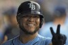Tampa Bay Rays' Harold Ramirez celebrates in the dugout after his two-run home run off Oakland Athletics starting pitcher James Kaprielian during the fifth inning of a baseball game Sunday, April 9, 2023, in St. Petersburg, Fla. (AP Photo/Chris O'Meara)