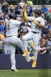 Milwaukee Brewers' Willy Adames celebrates with Rowdy Tellez after hitting a home run during the fifth inning of a baseball game against the St. Louis Cardinals Sunday, April 9, 2023, in Milwaukee. (AP Photo/Morry Gash)