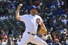 Chicago Cubs starting pitcher Jameson Taillon (50) delivers during the first inning of a baseball game against the, Texas Rangers, Sunday, April 9, 2023, in Chicago. (AP Photo/Matt Marton)
