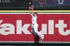 Los Angeles Angels right fielder Hunter Renfroe makes a leaping catch at the wall on a fly ball from Toronto Blue Jays' Daulton Varsho during the seventh inning of a baseball game, Sunday, April 9, 2023, in Anaheim, Calif. (AP Photo/Marcio Jose Sanchez)