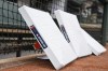 Bases lean near the dugout before an opening day baseball game between the Baltimore Orioles and the New York Yankees, Friday, April 7, 2023, in Baltimore. (AP Photo/Terrance Williams)