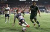 Vancouver Whitecaps FC's Ryan Gauld (left) gets pulled down by Portland Timbers' Evander during second half of MLS soccer action in Vancouver, B.C., Saturday, April 8, 2023. Facing a 3-0 deficit against one of only two undefeated teams in Major League Soccer, the Whitecaps maintain they can get a result against LAFC in the second leg of their CONCACAF Champions League matchup on Tuesday. THE CANADIAN PRESS/Rich Lam