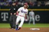 Texas Rangers' Travis Jankowski rounds second after hitting a double in the third inning of a baseball game against the Kansas City Royals, April 10, 2023, in Arlington, Texas. (AP Photo/Tony Gutierrez)
