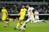 Real Madrid's Karim Benzema attempts a shot at goal during a Spanish La Liga soccer match between Real Madrid and Villarreal at the Santiago Bernabeu stadium in Madrid, Saturday, April 8, 2023. (AP Photo/Jose Breton)