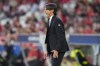 Inter Milan's head coach Simone Inzaghi gives instructions during the Champions League quarter final first leg soccer match between Benfica and Inter Milan at Luz stadium in Lisbon, Tuesday, April 11, 2023. (AP Photo/Armando Franca)