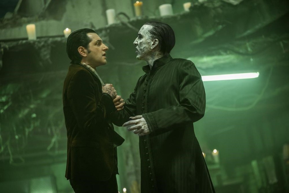 This image released by Universal Pictures shows Benjamin Schwartz, right, and Nicolas Cage in a scene from