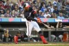 Minnesota Twins' Byron Buxton hits a two-run home run, the 100th home run of his career, during the first inning of the team's baseball game against the Chicago White Sox, Tuesday, April 11, 2023, in Minneapolis. (AP Photo/Craig Lassig)
