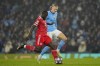 Bayern's Dayot Upamecano, left, fights for the ball with Manchester City's Erling Haaland during the Champions League quarterfinal, first leg, soccer match between Manchester City and Bayern Munich at the Etihad stadium in Manchester, England, Tuesday, April 11, 2023. (AP Photo/Jon Super)
