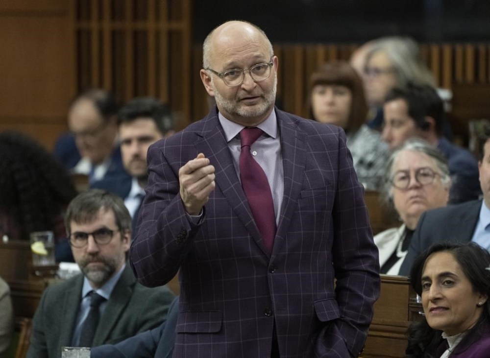 Minister of Justice and Attorney General of Canada David Lametti rises during Question Period, in Ottawa, Wednesday, March 29, 2023. Prime Minister Justin Trudeau is accusing Prairie premiers of distorting the words of his justice minister after comments David Lametti made at a meeting of Assembly of First Nations chiefs last week. THE CANADIAN PRESS/Adrian Wyld