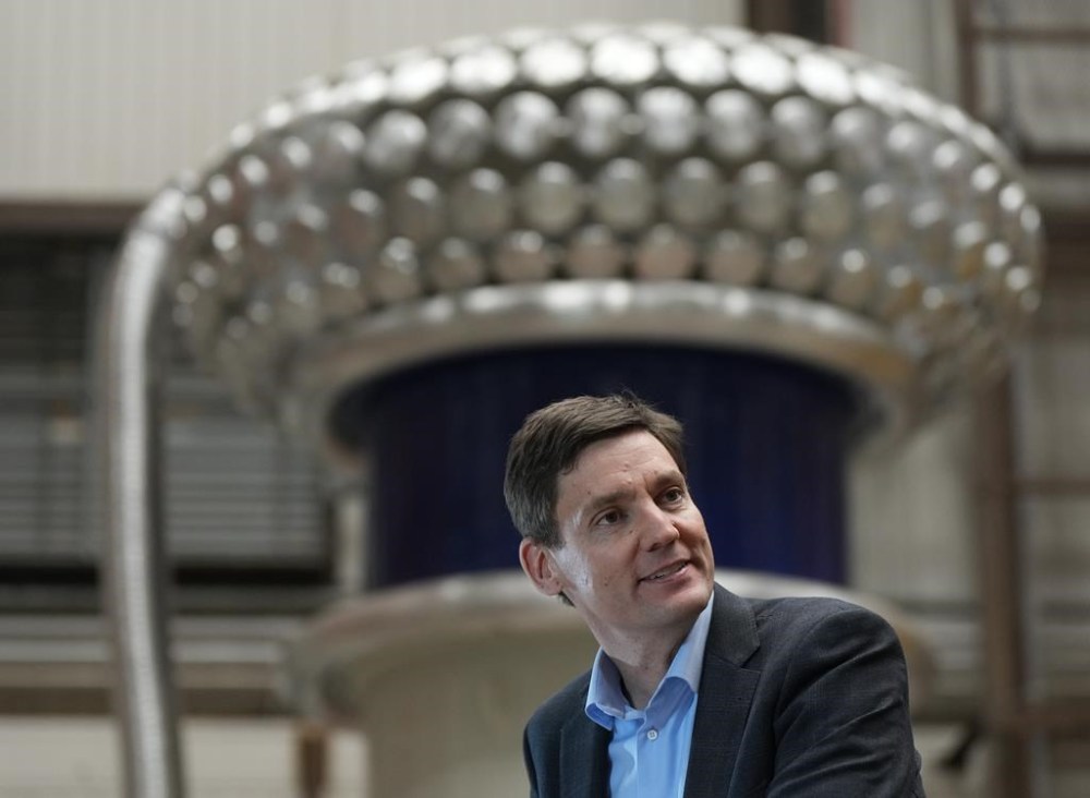 B.C. Premier David Eby speaks during a news conference as high voltage test set equipment is seen behind him at Powertech Labs, in Surrey, B.C., on Thursday, March 30, 2023. Eby says the government will create 12 law enforcement hubs in communities across the province from Nanaimo to Terrace that are dedicated to tackling and monitoring repeat violent offenders. THE CANADIAN PRESS/Darryl Dyck