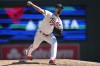 Minnesota Twins relief pitcher Jorge Lopez delivers during the seventh inning of a baseball game against the Chicago White Sox, Wednesday, April 12, 2023, in Minneapolis. (AP Photo/Abbie Parr)