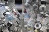 Jars full of empty COVID-19 vaccine vials are shown at the Junction Chemist pharmacy during the COVID-19 pandemic in Toronto on Wednesday, April 6, 2022. At least 19 million doses of COVID-19 vaccines are set to expire by the end of the year in Canada, according to data received by The Canadian Press. THE CANADIAN PRESS/Nathan Denette