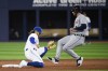 Toronto Blue Jays shortstop Bo Bichette (11) tags Detroit Tigers centre fielder Matt Vierling (8) stealing second base during sixth inning AL MLB baseball action, in Toronto on Wednesday, April 12, 2023. THE CANADIAN PRESS/Christopher Katsarov