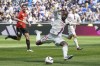 Lyon's Alexandre Lacazette scores his side's 2nd goal during the French League One soccer match between Lyon and Rennes at the Groupama stadium, in Decines, near Lyon, France, Sunday, April 9, 2023. (AP Photo/Laurent Cipriani)