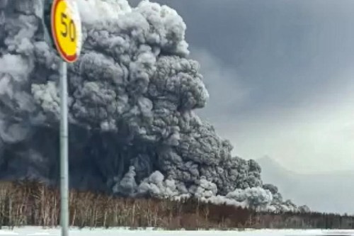 Smoke and ash are visible during the Shiveluch volcano's eruption on the Kamchatka Peninsula in Russia, Tuesday, April 11, 2023.Some flights out of northern British Columbia are cancelled due to ash from the volcano that erupted thousands of kilometres away. THE CANADIAN PRESS/AP-Alexander Ledyayev