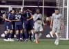 CF Montreal defenders, including Aaron Herrera (22), walk away as New England Revolution players celebrate after Giacomo Vrioni goal in the second half of an MLS soccer match against Saturday, April 8, 2023, in Foxborough, Mass. CF Montreal off to their worst start ever in Major League Soccer, ahead of a three-game homestand, beginning Saturday against D.C. United. THE CANADIAN PRESS/AP-Mark Stockwell
