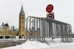 The federal government wants to keep the street in front of Parliament Hill closed, and has offered to take it over from the city of Ottawa. Fencing is seen on Parliament Hill in Ottawa, one year after the Freedom Convoy protests took place, on Friday, Jan. 27, 2023. THE CANADIAN PRESS/Justin Tang