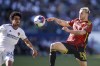 Seattle Sounders forward Jordan Morris (13) controls the ball against LA Galaxy defender Jalen Neal (24) during the first half of an MLS soccer match in Carson, Calif., Saturday, April 1, 2023. (AP Photo/Ringo H.W. Chiu)