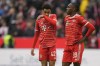 Bayern's Mathys Tel, right and Bayern's Jamal Musiala react after the German Bundesliga soccer match between Bayern Munich and 1899 Hoffenheim, at the Allianz Arena stadium in Munich, Germany, Saturday, April 15, 2023. (AP Photo/Matthias Schrader)