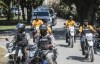 Police escort a FIFA delegation as part of a global tour ahead of the Women’s World Cup, in Port-au-Prince, Haiti, Saturday, April 15, 2023. The delegation is scheduled to travel with the iconic trophy to all 32 participating nations of the soccer tournament which kicks off on July 20th, co-hosted by Australia and New Zealand. (AP Photo/Odelyn Joseph)