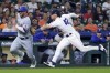 Texas Rangers' Travis Grossman, left, is tagged out by Houston Astros third baseman Alex Bregman during the third inning of a baseball game Saturday, April 15, 2023, in Houston. (AP Photo/Michael Wyke)