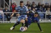 San Jose Earthquakes defender Paul Marie (3) and Sporting Kansas City midfielder Erik Thommy vie for the ball during the first half of an MLS soccer match Saturday, April 15, 2023, in San Jose, Calif. (Jose Carlos Fajardo/Bay Area News Group via AP)