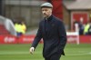 Manchester United's head coach Erik ten Hag walks on the pitch ahead the English Premier League soccer match between Nottingham Forest and Manchester United at City ground in Nottingham, England, Sunday, April 16, 2023. (AP Photo/Rui Vieira)