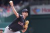 Cleveland Guardians' starting pitcher Shane Bieber throws during the first inning of a baseball game against the Washington Nationals in Washington, Sunday, April 16, 2023. (AP Photo/Manuel Balce Ceneta)