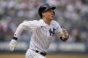 New York Yankees' Anthony Volpe runs to first on a single off Minnesota Twins starting pitcher Pablo Lopez in the fifth inning of a baseball game, Sunday, April 16, 2023, in New York. (AP Photo/John Minchillo)