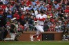 St. Louis Cardinals' Lars Nootbaar, right, watches his two-run home run against the Pittsburgh Pirates during the sixth inning of a baseball game Sunday, April 16, 2023, in St. Louis. (AP Photo/Jeff Le)