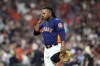 Houston Astros starting pitcher Framber Valdez wipes his face after being pulled from the baseball game during the seventh inning against the Texas Rangers Sunday, April 16, 2023, in Houston. (AP Photo/David J. Phillip)