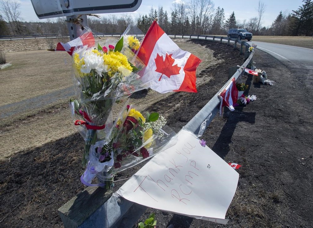 A memorial pays tribute to RCMP Const. Heidi Stevenson, a 23-year member of the force and mother of two, along the highway in Shubenacadie, N.S. on Tuesday, April 21, 2020. The federal-provincial inquiry into the 2020 Nova Scotia mass shooting last month published a 3,000-page final report with dozens of recommendations. THE CANADIAN PRESS/Andrew Vaughan