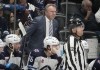 Winnipeg Jets head coach Rick Bowness, top center, looks on in the second period of an NHL hockey game against the Colorado Avalanche, Thursday, April 13, 2023, in Denver. (AP Photo/David Zalubowski)
